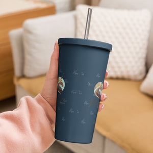 Navy blue Xpresso Unicorn tumbler with a straw, held in someone's hand. Perfect for staying hydrated on the go.