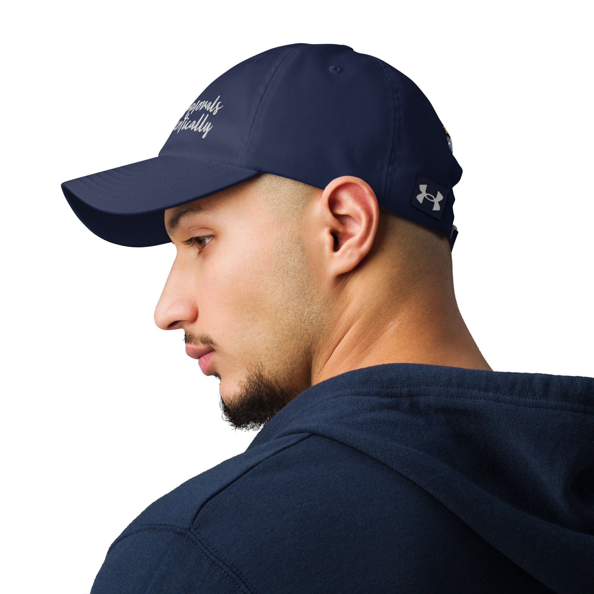 A navy blue Under Armour hat worn by a man, showcasing its classic style.