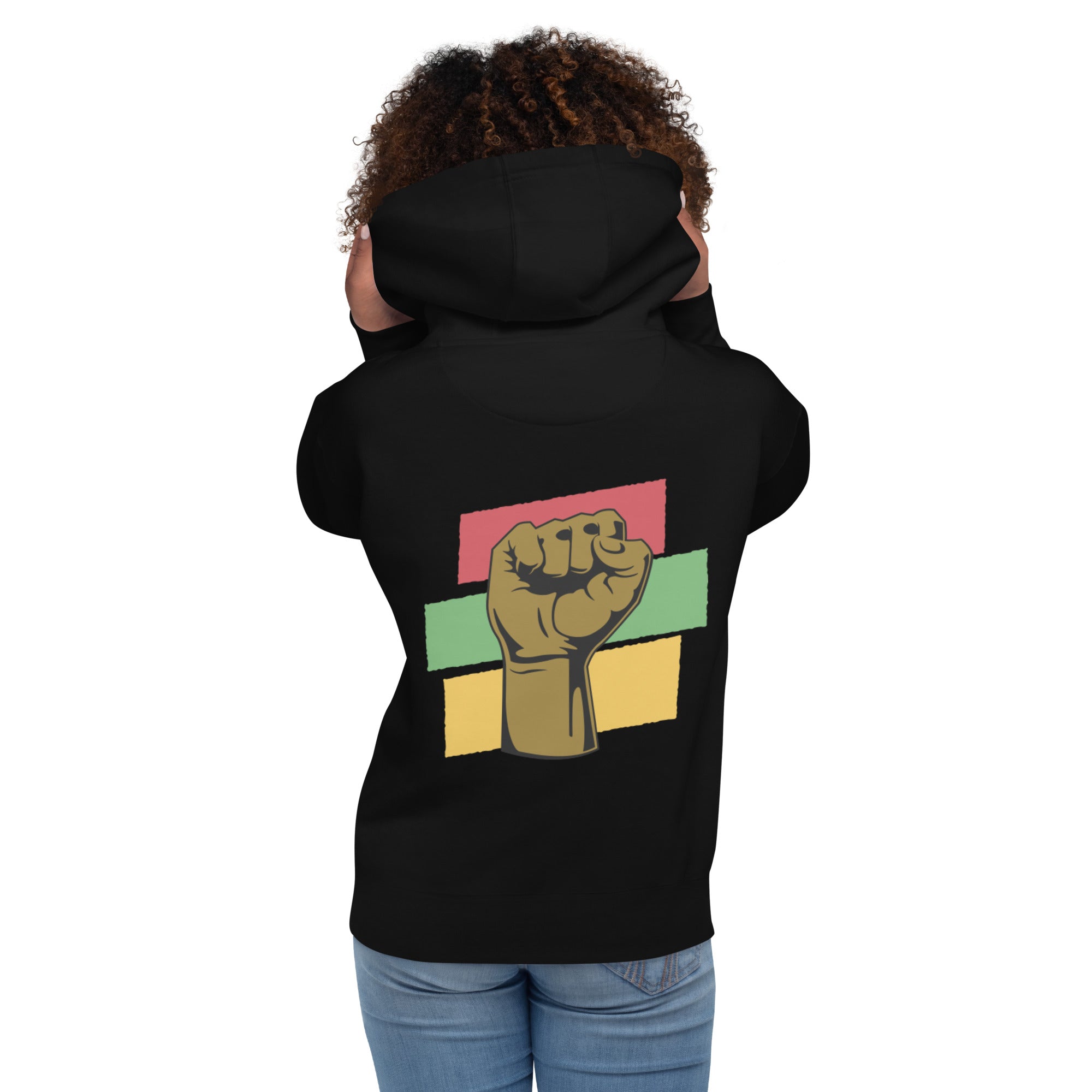 The back of a black hoodie showcases a raised black fist, a powerful symbol of Black empowerment and resilience.