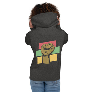 The back of a charcoal hoodie showcases a raised black fist, a powerful symbol of Black empowerment and resilience.