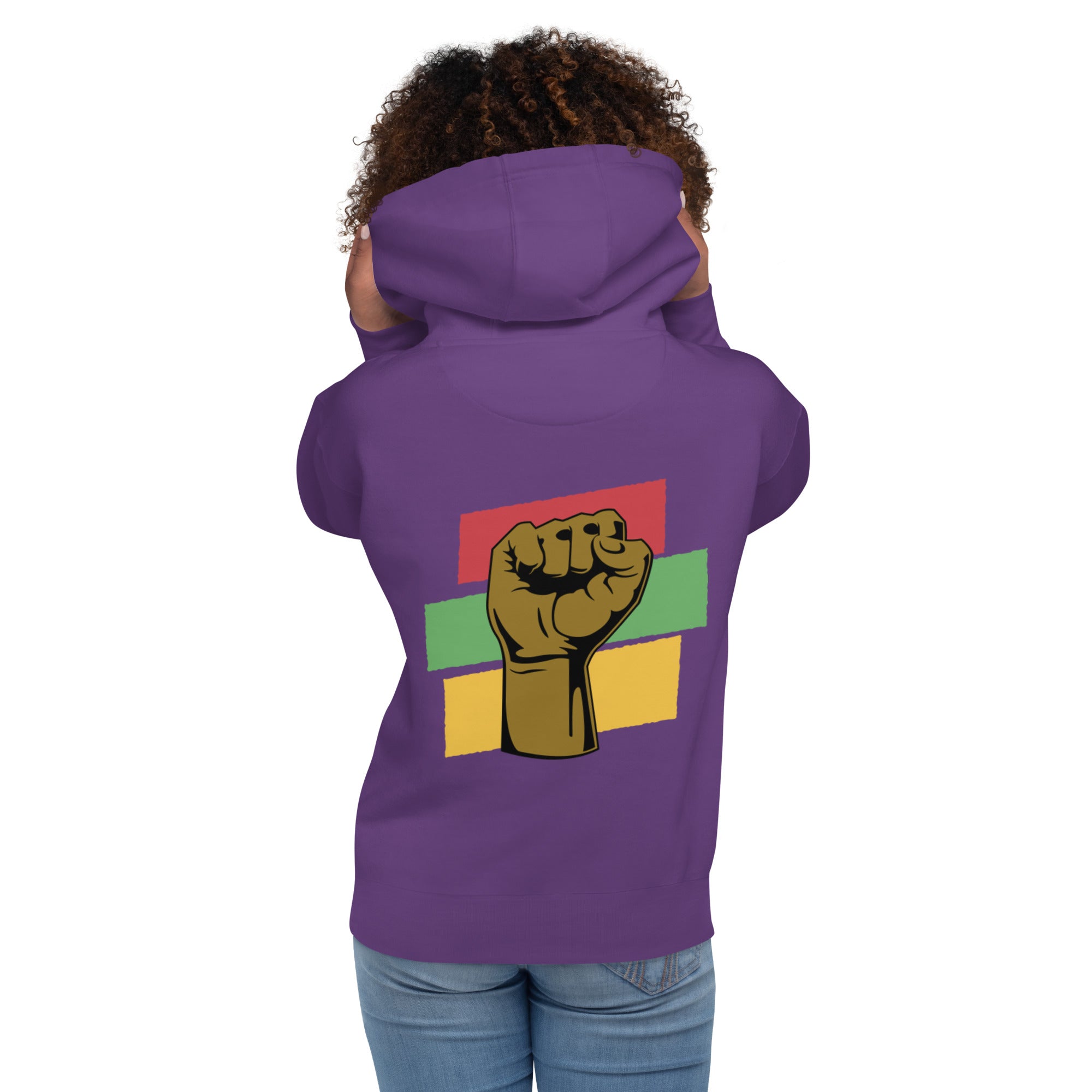 The back of a purple hoodie showcases a raised black fist, a powerful symbol of Black empowerment and resilience.